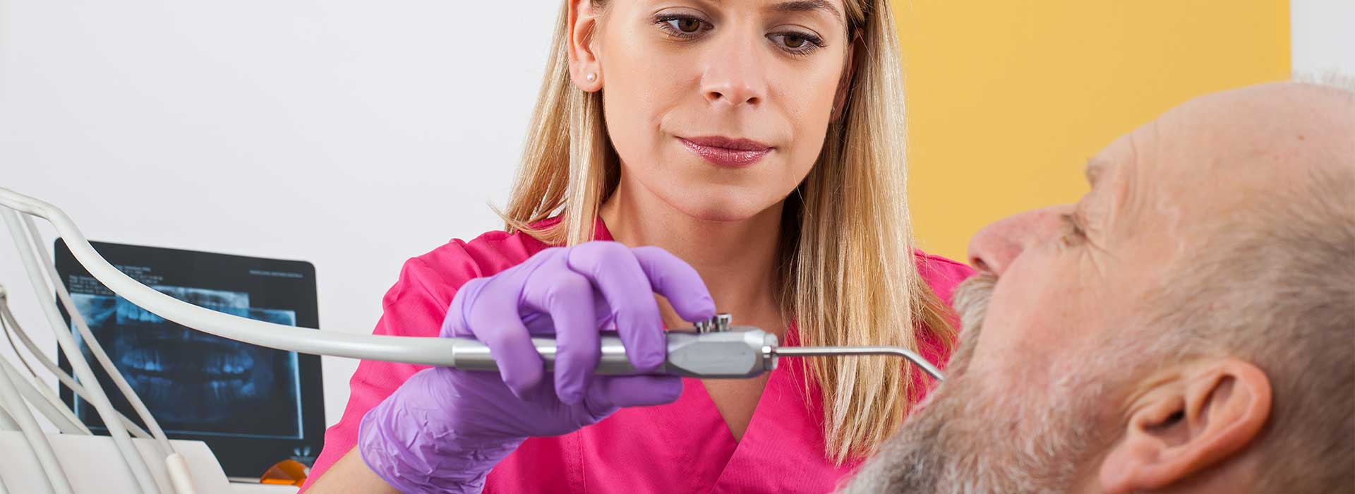 Dentist doing a dental cleaning process